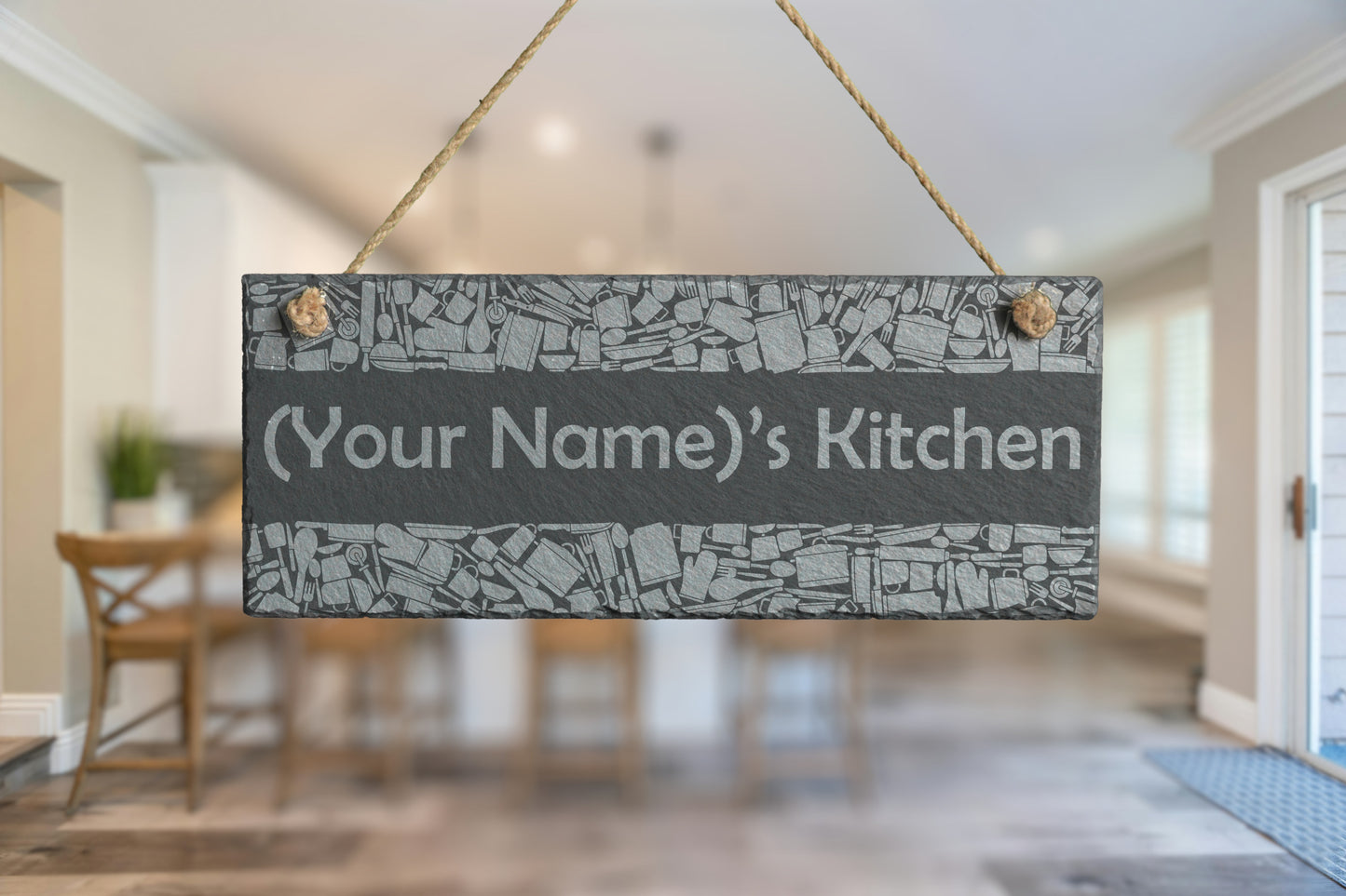 Decorative slate sign with 'Your Name's Kitchen' text in a kitchen setting