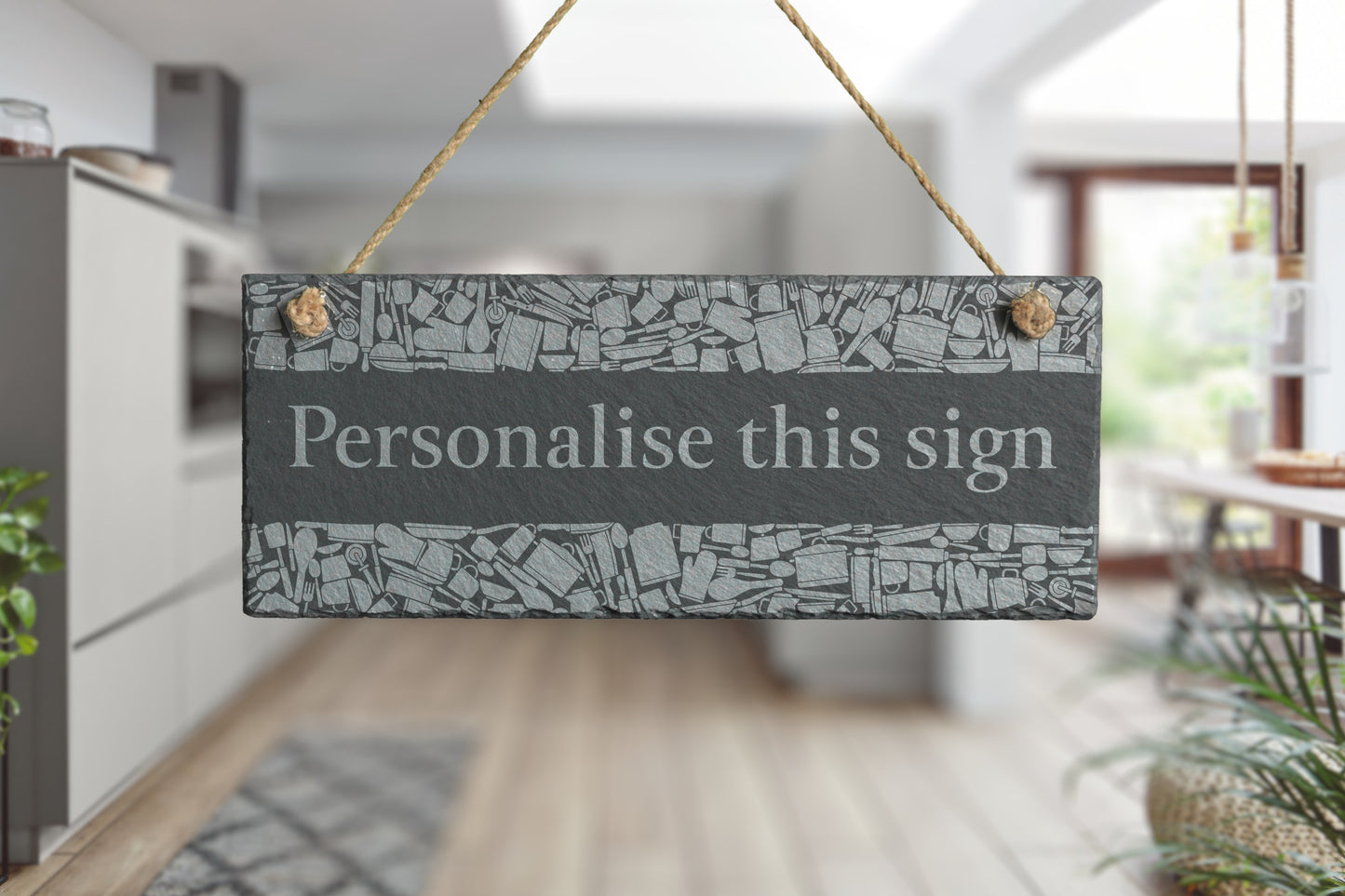 Decorative slate sign with 'Personalise this sign' text in a kitchen setting