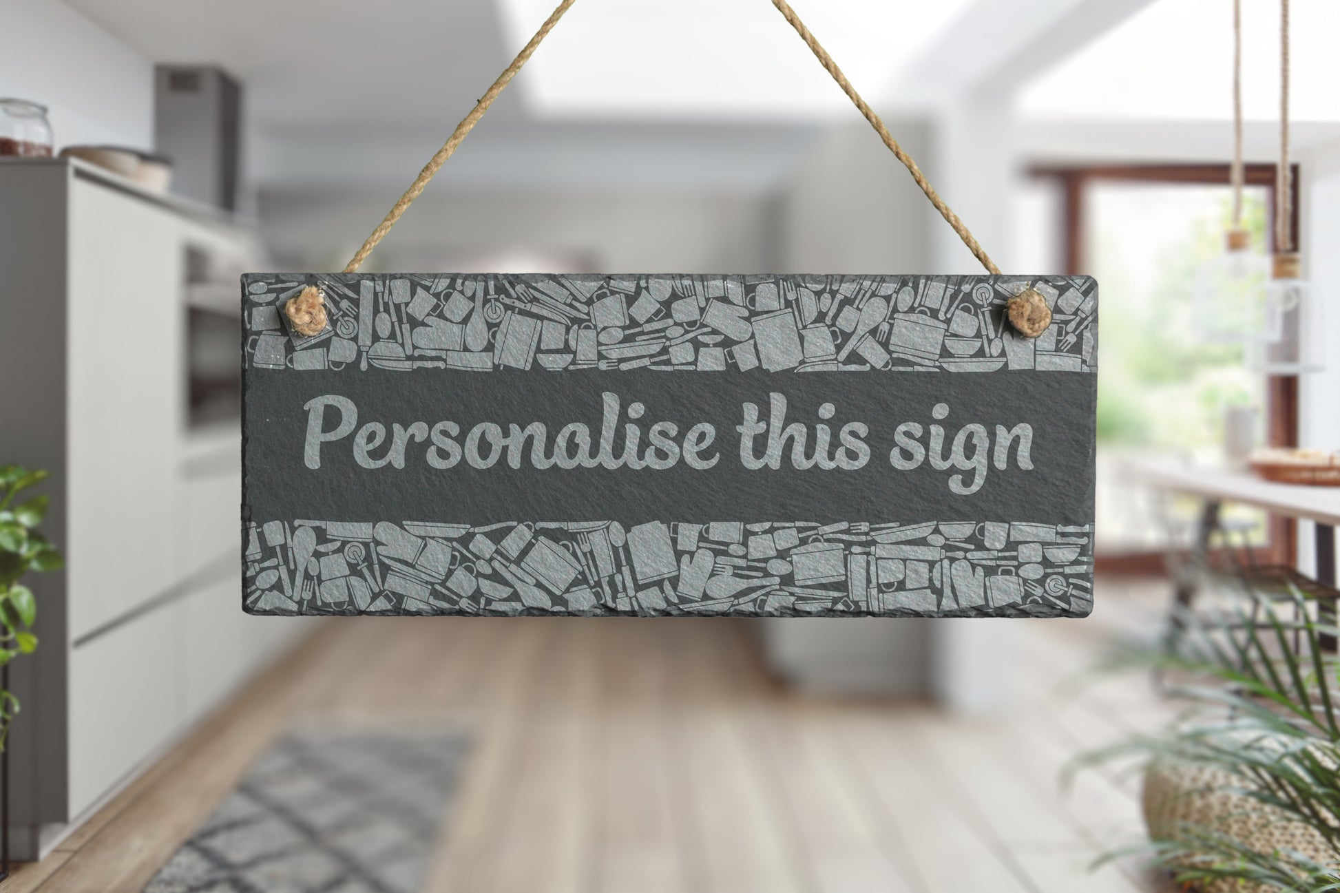 Decorative slate sign with 'Personalise this sign' text in a kitchen setting